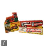 Two Dinky Toys diecast models, a 279 Aveling-Barford Diesel Road Roller in orange with green metal