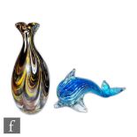 A contemporary Mdina glass vase of compressed ovoid form with flared neck, internally decorated with