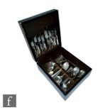 A cased hallmarked silver canteen of cutlery for eight place settings to include dinner knives and