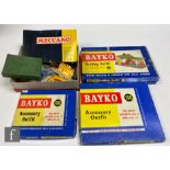 A collection of assorted construction toys to include Bayko Building Outfit 12, Bayko Accessory