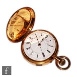 An 18ct hallmarked full hunter crown wind pocket watch, Roman numerals to a white enamelled dial,