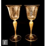 A pair of later 20th Century Venetian wine glasses by Vecchia Murano with a round funnel bowl with