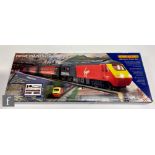 An OO gauge Hornby Virgin Trains 125 Train Set with a power car, dummy car, two open coaches, and