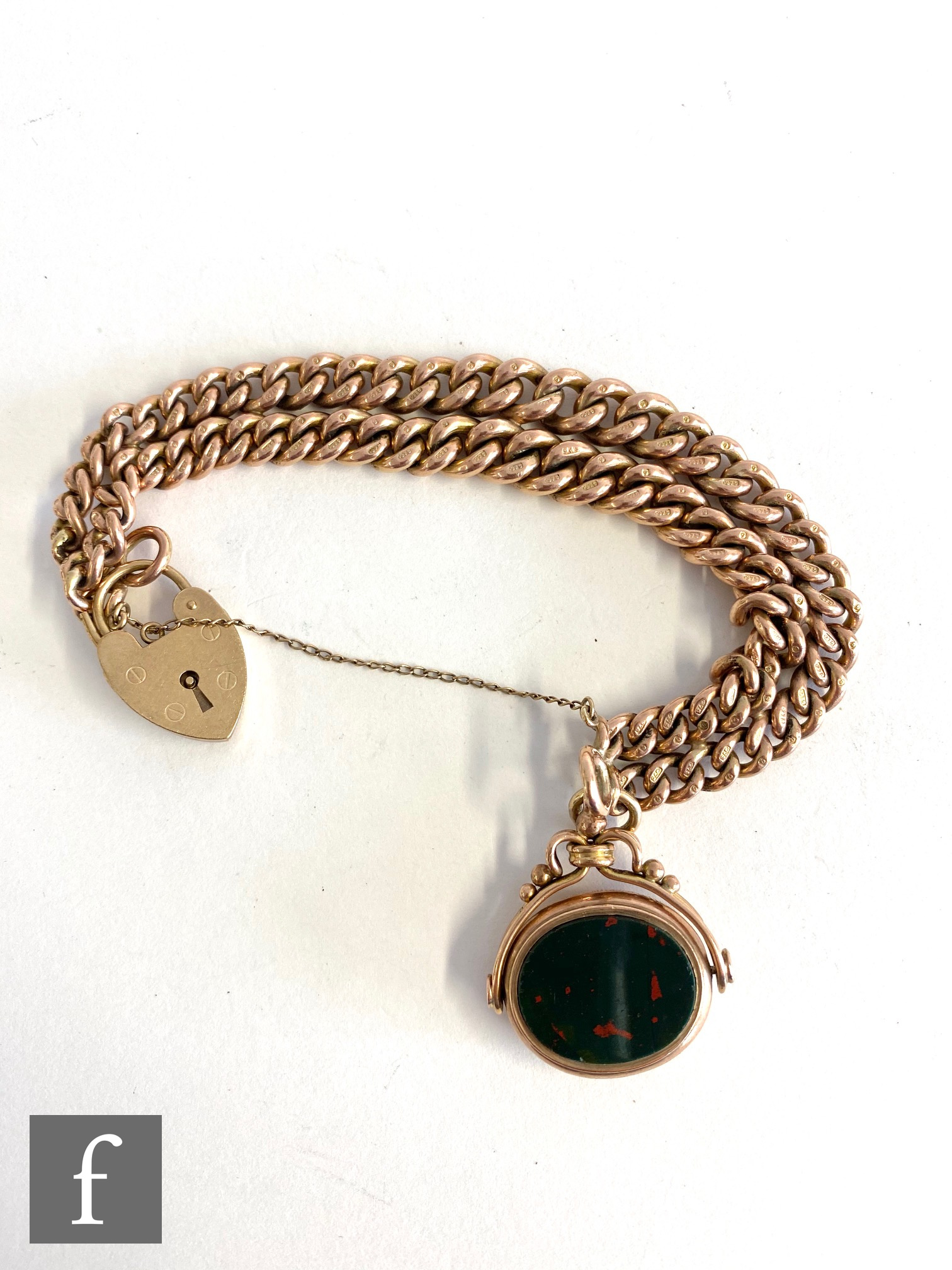 A 9ct rose gold graduated double Albert chain converted to a double chain bracelet with 9ct swivel