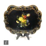 A 19th Century papier mache serving tray with raised edge, the central black ground painted with a