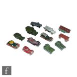 A collection of mostly pre-war Dinky Toys and Tootsietoys, to include military and commercial