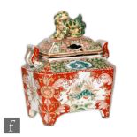 A 19th Century Chinese enamelled censer of rectangular form, raised on pad supports, the reticulated