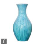 A Pilkingtons Royal Lancastrian shape 2816 skittle vase decorated in an all over mottled ice blue