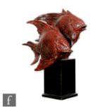 A 1930s Italian painted terracotta model of two angelfish with a shell behind, modelled by M.