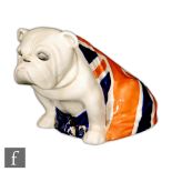 A Royal Doulton bulldog draped in a Union Jack flag, printed mark, RdNo. 645658, height 10cm, length