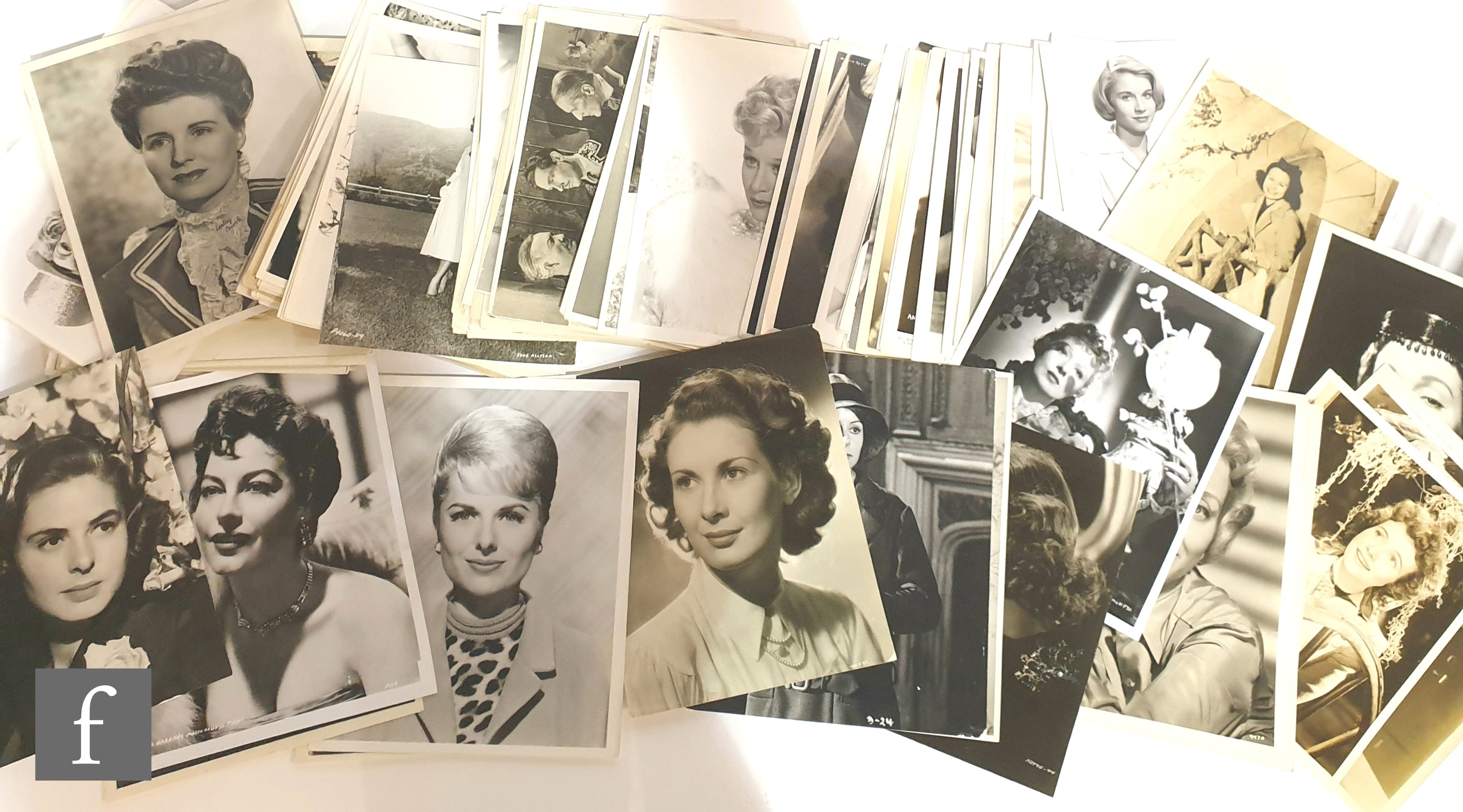 A large collection of 8x10 vintage portraits of mostly female stars including Vivien Leigh, Joan