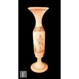 A 19th Century Richardsons vitrified enamel vase of slender footed form with a flared collar neck,