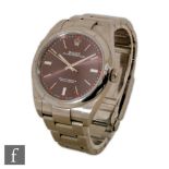 A gentleman's stainless steel Rolex Oyster Perpetual wrist watch with batons to a red grape dial,