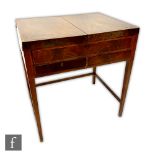 A George III and later converted crossbanded mahogany washstand, the top opening to reveal a