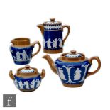 A late 19th Century Dudson part teaset comprising teapot, hot water jug, milk jug and sugar bowl