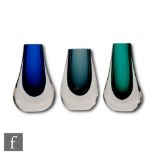 A collection of Whitefriars vases, comprising two shape 9572 Teardrop vases in Kingfisher Blue and