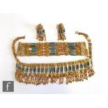An Egyptian style gilt metal, coral and turquoise suite of jewellery comprising a necklet, multi