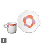 Johan van Loon - Rosenthal - A boxed tea cup and saucer with textured bodies and coloured abstract