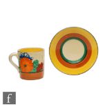 Clarice Cliff - Gay Day - A Tankard shape coffee cup and saucer circa 1930 hand painted with