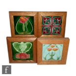 Unknown - Three framed Art Nouveau 6in dust pressed tiles each decorated with a stylised floral