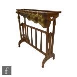 Unknown, possibly Liberty & Co - An Arts and Crafts oak framed floor standing xylophone complete