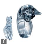 Daum - A contemporary clear crystal glass figure of a stylised seated cat with head down, engraved