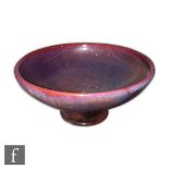 Pilkingtons Royal Lancastrian - A 1950s hand thrown footed shallow bowl decorated in an all over