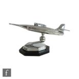 Gala Sonic - A 1950s chrome plated 'Jet plane' table lighter, the octagonal bakelite base mounted