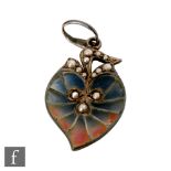 Unknown - An early 20th Century Art Nouveau plique-a-jour enamel pendant drop formed as a petal with