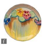 Clarice Cliff - Delecia Pansies - A wave edge plate circa 1932 with stylised flowers over a