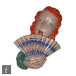 Rudolf Knorlein - Goldscheider - A 1930s Art Deco wall mask modelled as a lady with orange wavy hair