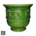 Unknown - An early 20th Century Secessionist jardiniere decorated with panels of relief moulded