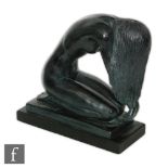 Unknown - A later 20th Century sculpture modelled as a nude female kneeling with her long hair