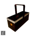 An Art Deco style lucite and chromed champagne carrier, the rectangular form container with swing