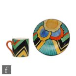 Grays Pottery - A coffee cup and saucer hand painted with abstract flowers and foliage, printed