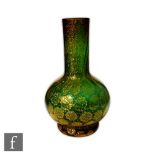 Giulio Radi - AVEM - A post war Italian Murano glass vase of footed globe and shaft form, cased in