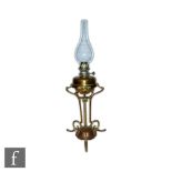 Hinks - An Edwardian Arts and Crafts style anodized copper table oil lamp in the manner of W.A.S.