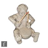 Robert Wallace Martin - Martin Brothers - A small seated figure of a grotesque musician with smiling