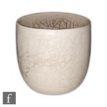 Unknown - A later 20th Century studio pottery vase of oval form, the white slip body with a smoke