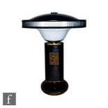 Eileen Gray - Jumo - A Siren or Mermaid table lamp circa 1940, the black and brass domed base rising