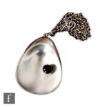 Nanna and Jorgen Ditzel - Georg Jensen - A post war pendant formed as a stylised oyster shell set