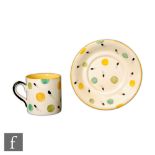 Susie Cooper - A Kidney Bean pattern coffee can and saucer hand painted with spots and abstract