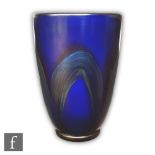 Louis Comfort Tiffany - An early 20th Century vase, circa 1905, of footed sleeve form, decorated