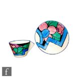 Clarice Cliff - Latona Dahlia - A Conical shape tea cup and saucer circa 1930, hand painted to the