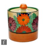 Clarice Cliff - Gay Day - A Drum shape preserve pot circa 1932, hand painted with stylised flowers