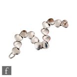 Hans Hansen - A Danish 925 silver bracelet formed from fourteen heart shapes (includes the clasp),