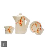 Clarice Cliff - Tangerine Fruit - A conical coffee pot, milk jug, cup and saucer circa 1931 hand