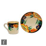 Clarice Cliff - Garland - A Tankard shape coffee can and saucer circa 1928 hand painted with