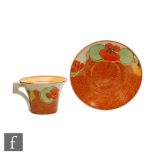 Clarice Cliff - Nasturtium - A Daffodil shape tea cup and saucer circa 1932 hand painted with a band
