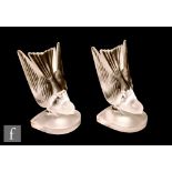 Lalique - A pair of post war Hirondelle clear and frosted crystal glass bookends modelled as